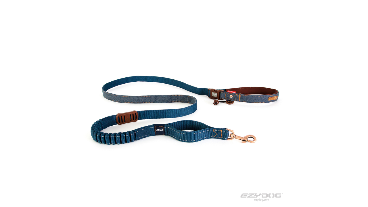 Shock absorbing clearance leash attachment